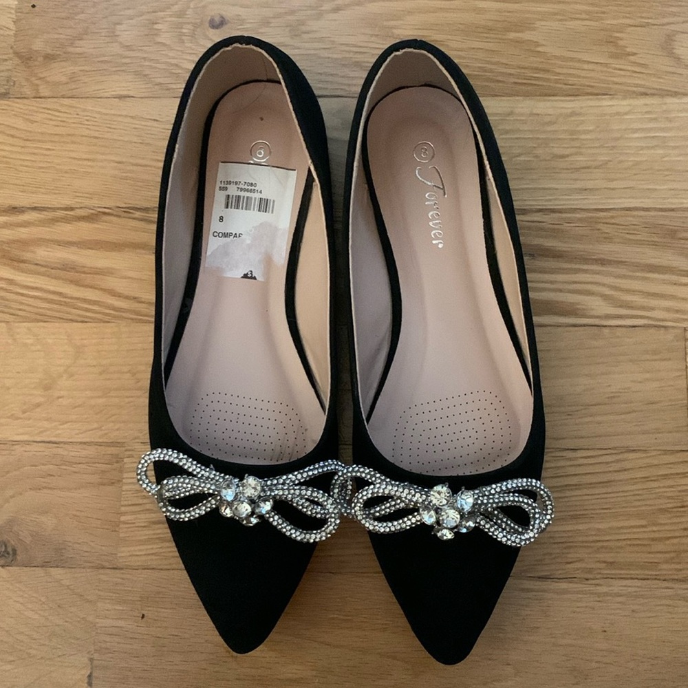 Black pointy toe bow flats